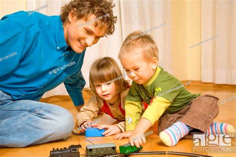 Father Spending Time With Children Stock Photo Picture And Rights