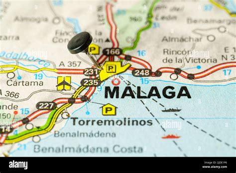 Tourist Destination Of Malaga With A Pin On A Map Macro Photo Stock