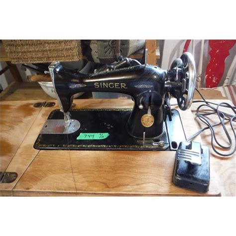 Singer electric sewing machine working.