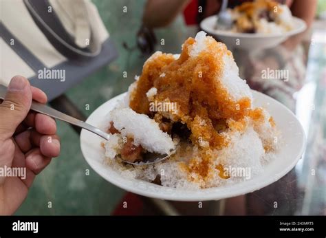 Eating Shaved Ice With Colorful Dessert Stock Photo Alamy