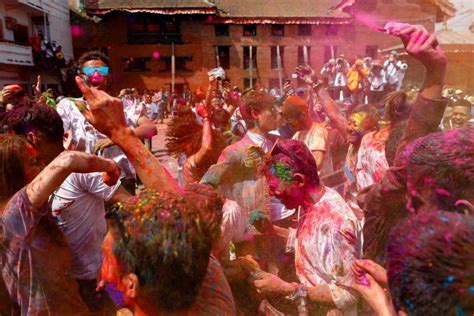 Explosion Of Colour During Holi Festival As Thousands Fight With Dye