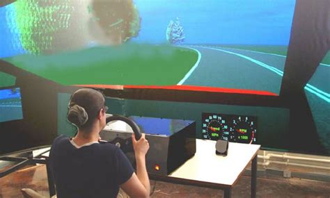 The car driving simulator used in the experiments | Download Scientific ...