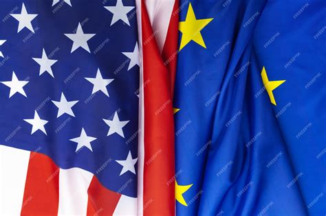 Premium Photo Closeup Of Flags Of Usa And European Union Lying