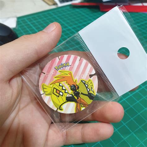 Jual Pokemon Coin Tazos Chiki Balls Tapu Koko Shopee Indonesia