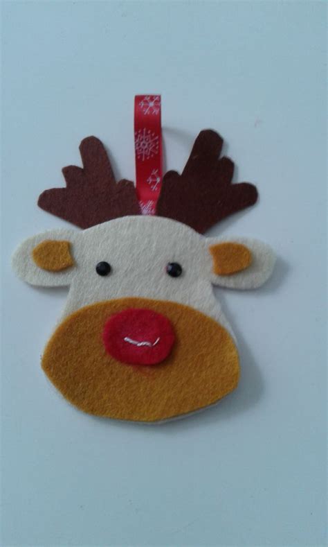 A Felt Reindeer Ornament With A Red Nose And Antlers On It S Head