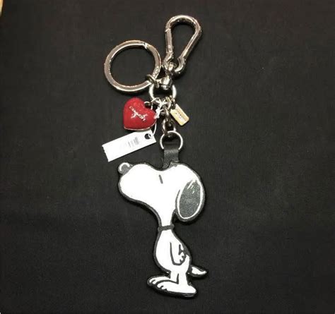 コーチ Coach Peanuts スヌーピー コラボ レザーキーホルダー 新発売 3420円引き Swimmainjp