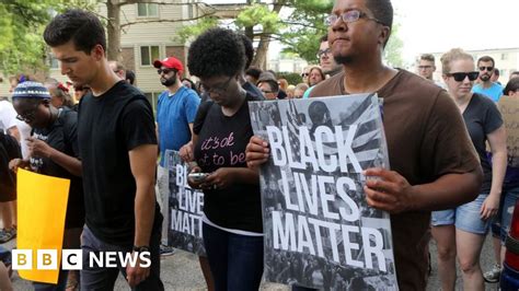 Ferguson Anniversary Tyrone Harris Charged With Assault Bbc News