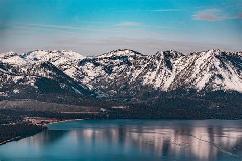 Snow Covered Mountain Near Lake · Free Stock Photo