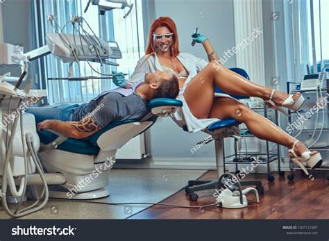 Sexy Hot Redhead Dentist Woman Taking Stock Photo 1007121697 Shutterstock
