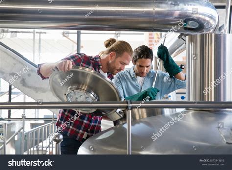 Wide Shot Brewery Workers Checking Fermentation Stock Photo 1873343656