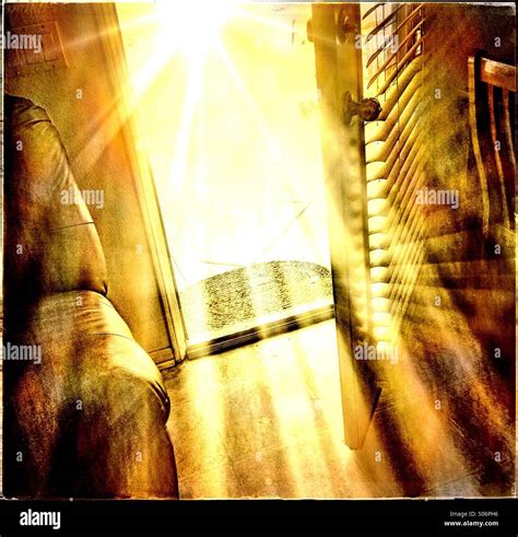 Bright Sunlight Shining Through An Open Door Stock Photo Alamy