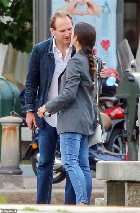 Ralph Fiennes Gets Cosy With Pretty Brunette As He Takes A Break From