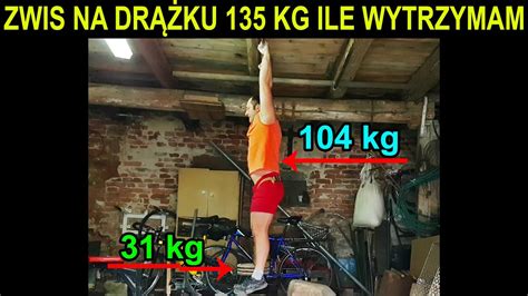 Trening przedramion Zwis na drążku z obciążeniem 135kg waga ciała 104