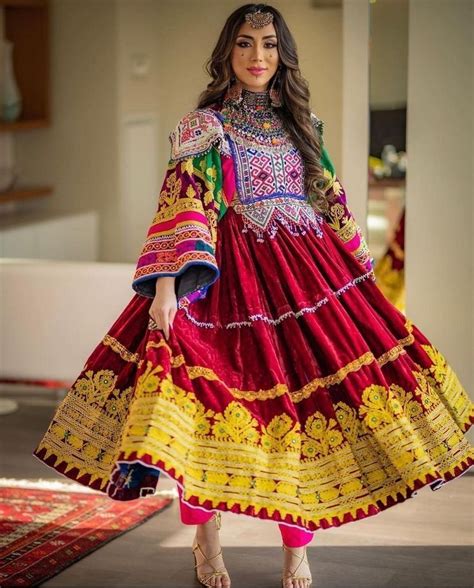 A Woman In A Red And Yellow Dress