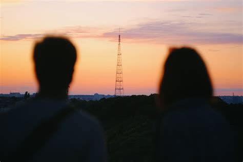 Couple Silhouette at Sunset · Free Stock Photo