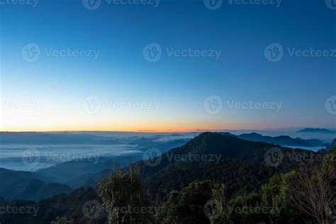 Aerial view of misty mountains at sunrise 6719611 Stock Photo at Vecteezy