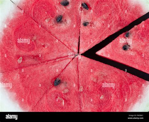 Triangle Shaped Watermelon Slices On Black Bakcground Extreme Closeup