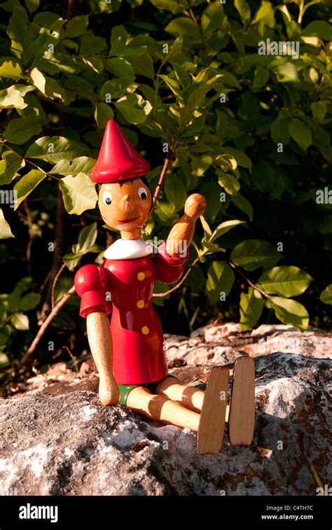 Pinocchio Italian Wooden Puppet With Long Nose In The Nature Stock