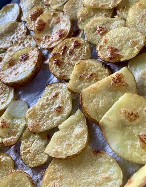 Baked sliced potatoes stock photo. Image of cooked, bubbled - 176704478