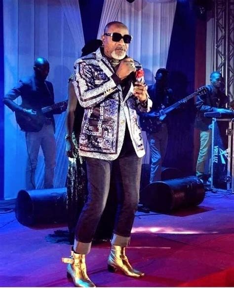 Koffi Olomide attacks cameraman, banned from pefoming