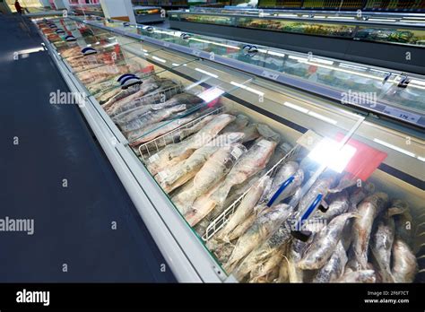 Row Of Refrigerator With Frozen Fish In The Supermarket Stock Photo Alamy