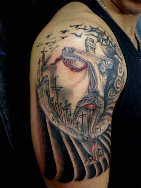 Awesome crucifixion of jesus tattoo on shoulder - Tattooimages.biz