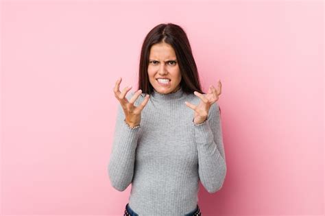 Premium Photo Young Cute Woman Upset Screaming With Tense Hands