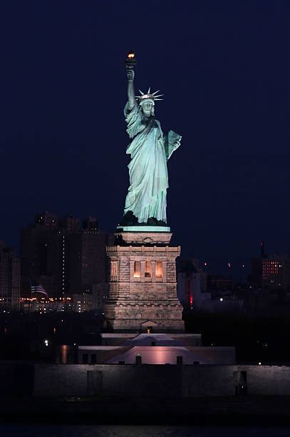 Royalty Free Statue Of Liberty At Night Pictures, Images and Stock ...