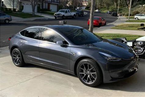 Tinted windshield, aero caps removed, midnight silver Tesla Model 3 – Tesla Model 3 Wiki