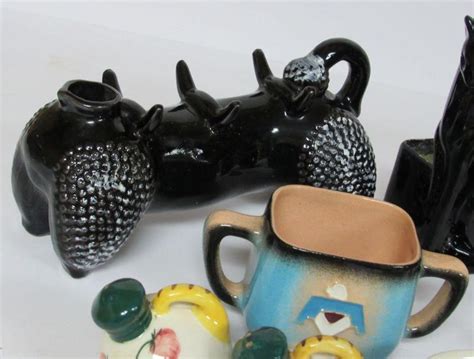 Lot of Mismatch and Orphins But the Shakers are a Pair | EstateSales.org