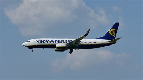 Ryanair Boeing Jet Flying Up In The Sky And Landing On Runway Stock