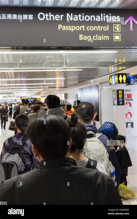 People Waiting To Go Through Passport Control At Australian Border In