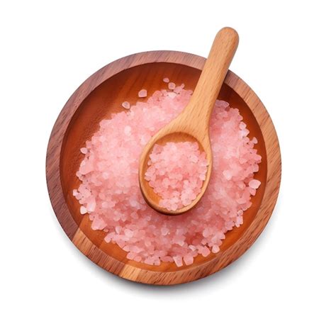 Premium Photo A Wooden Bowl Of Sea Salt With A Wooden Spoon On A