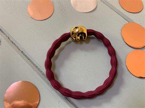 Lupe Elephant Charm Hairband Bracelet Burgundy Gold Lizzielane