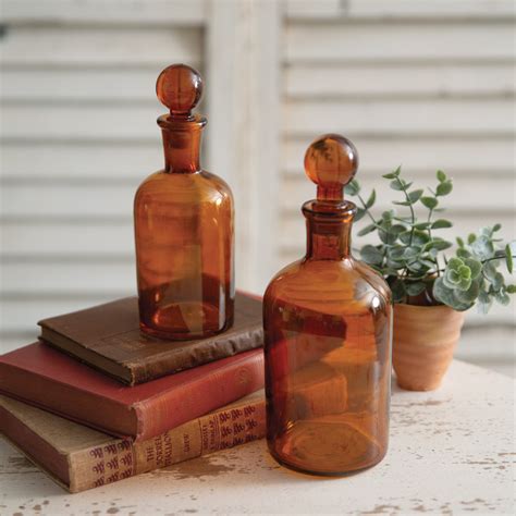 Set of Two Amber Glass Bottles with Stoppers | CTW Home Collection