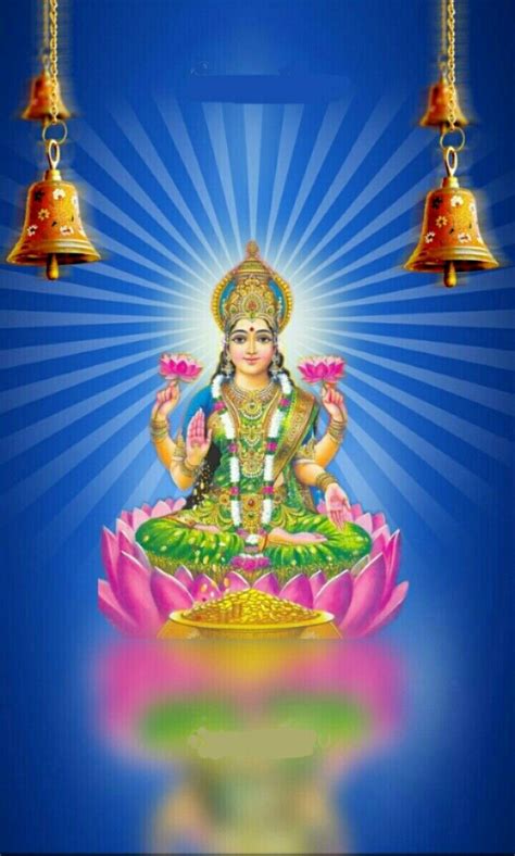 An Image Of The Hindu God Sitting On Top Of A Lotus Flower With Bells