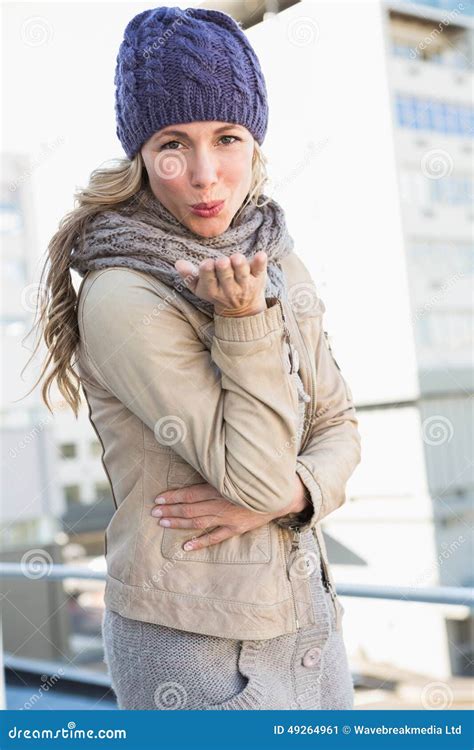 Pretty Blonde In Warm Clothes Blowing A Kiss Stock Image Image Of