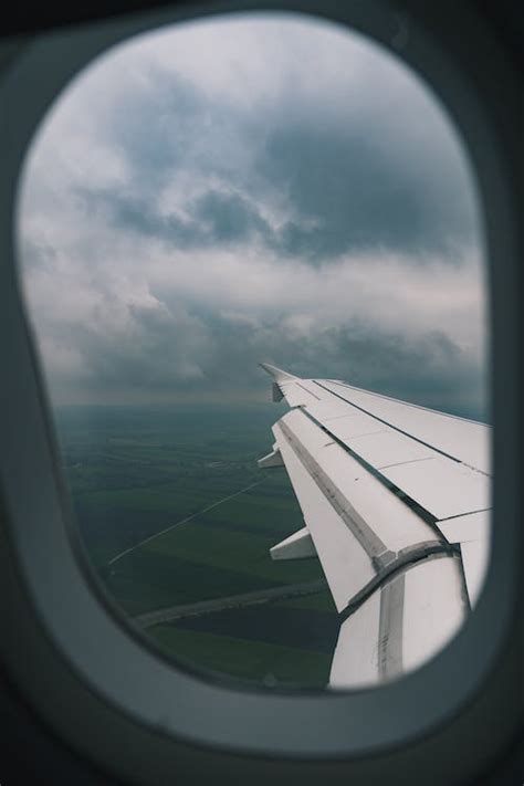 Airplane Window View of Clouds · Free Stock Photo