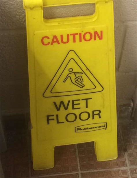 This wet floor sign I found : funny