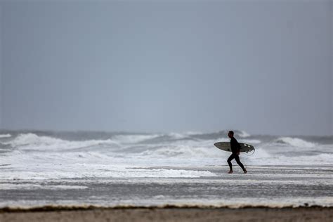 Flood warnings into Saturday and more swimming bans are in effect at