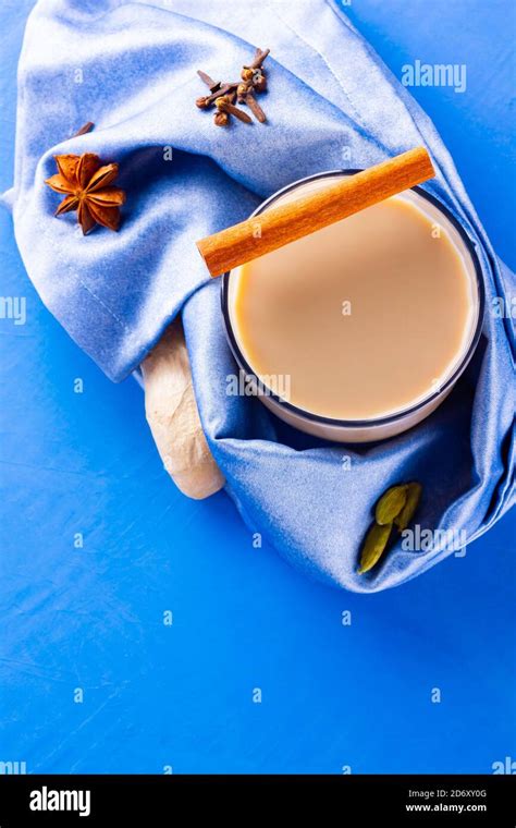 Masala Chai Tea On A Blue Napkin Traditional Indian Drink Masala Tea With Various Spices