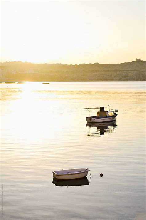 Sunset Boats By Stocksy Contributor Mihajlo Ckovric Stocksy