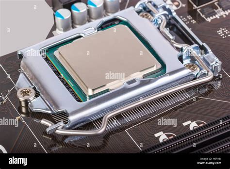 CPU socket on motherboard with installed a processor Stock Photo - Alamy