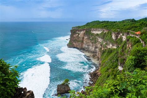 Uluwatu Coast With Rocks And Ocean Waves Bali Indonesia Stock Photo