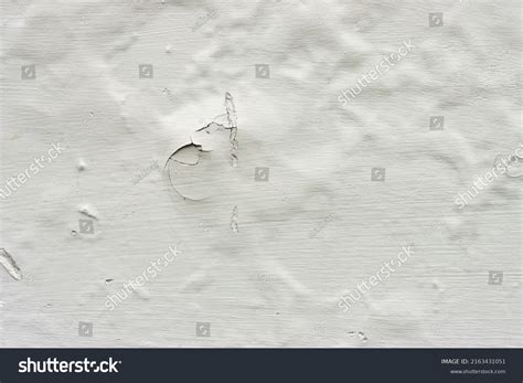 how to fix bubbled paint on wall