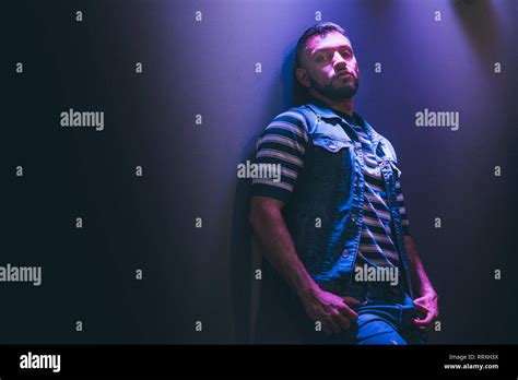 Handsome Bearded Man Dancing In Spotlight Stock Photo Alamy