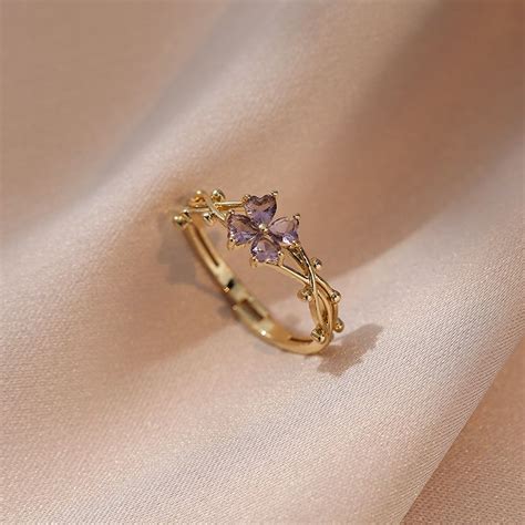 Purple Four Petal Flower Ring In 2024 Fancy Jewelry Womens Jewelry