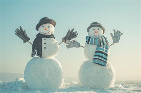 Premium Photo Snowman With Hat And Scarf In Winter Outdoor Happy