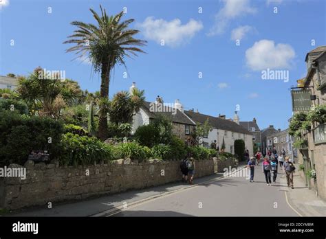 Holiday Makers Walking In Hugh Town High Street On St Marys Island