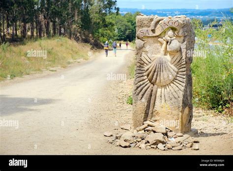 Pilgrims Walking On A Path To Santiago De Compostela Stock Photo Alamy